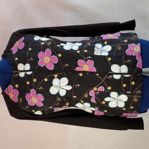 Women baby phat nursing srub jacket.